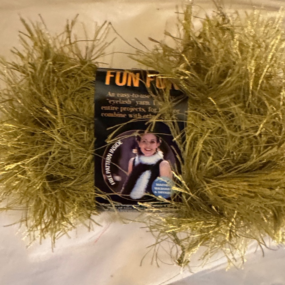 Fun Fur olive colored Yarn -26 count total